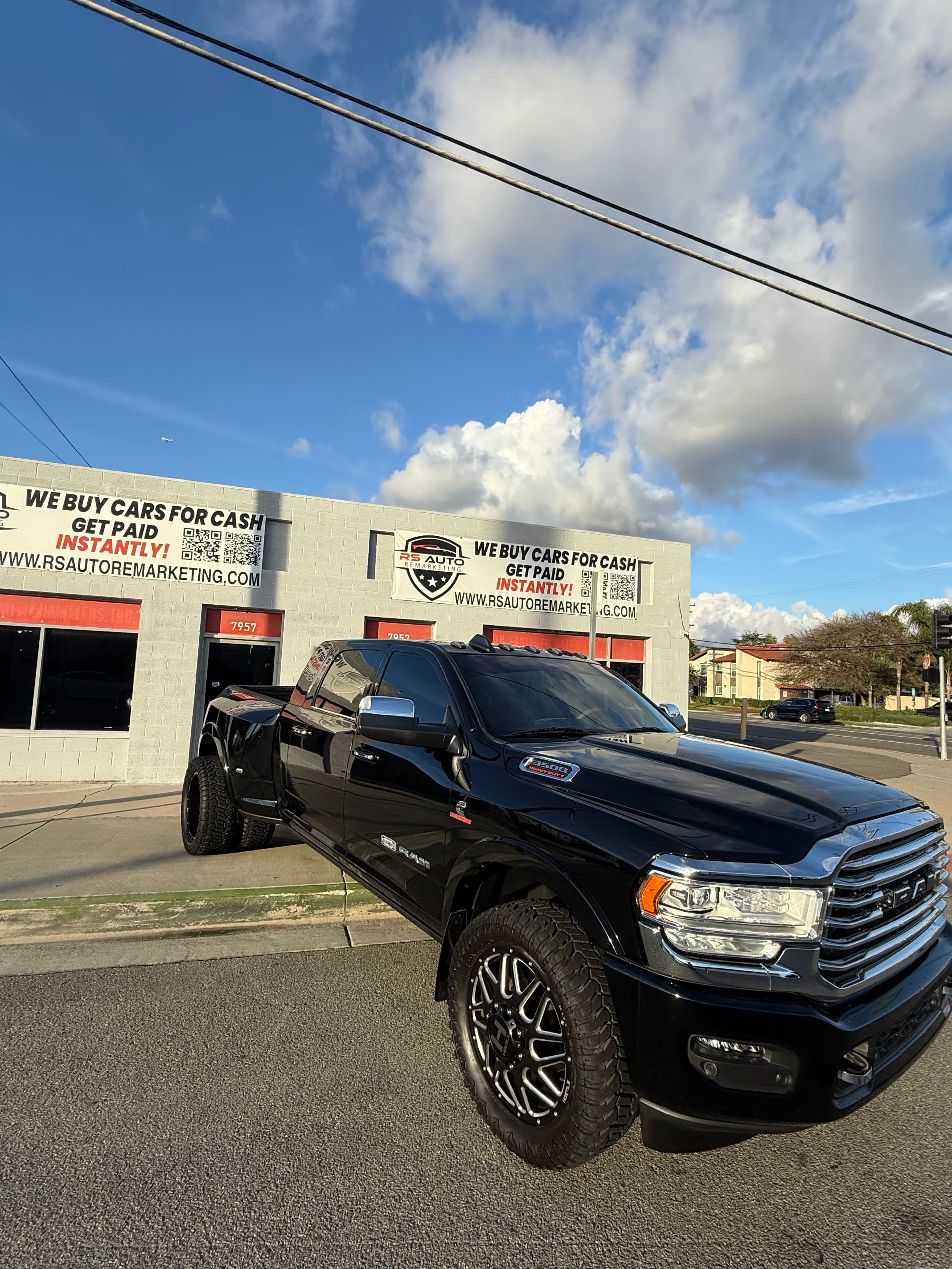 Ram pickup parked outside the RS Auto shop